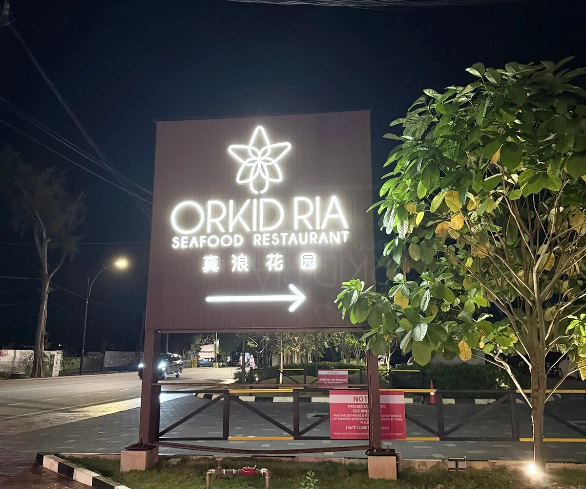 Our sign after dark at Orkid Ria Seafood Restaurant