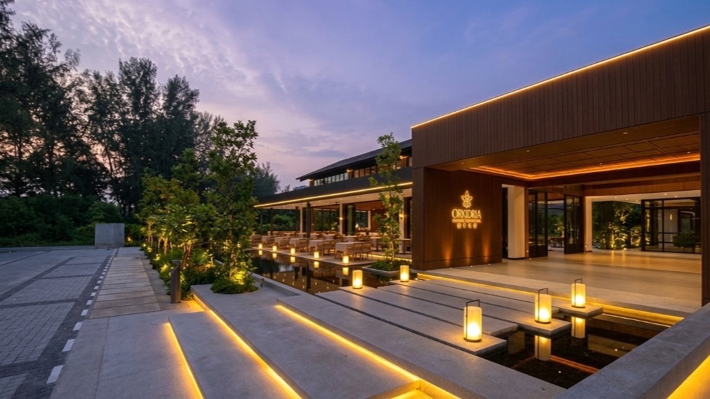Entrance and reflecting pool at dusk